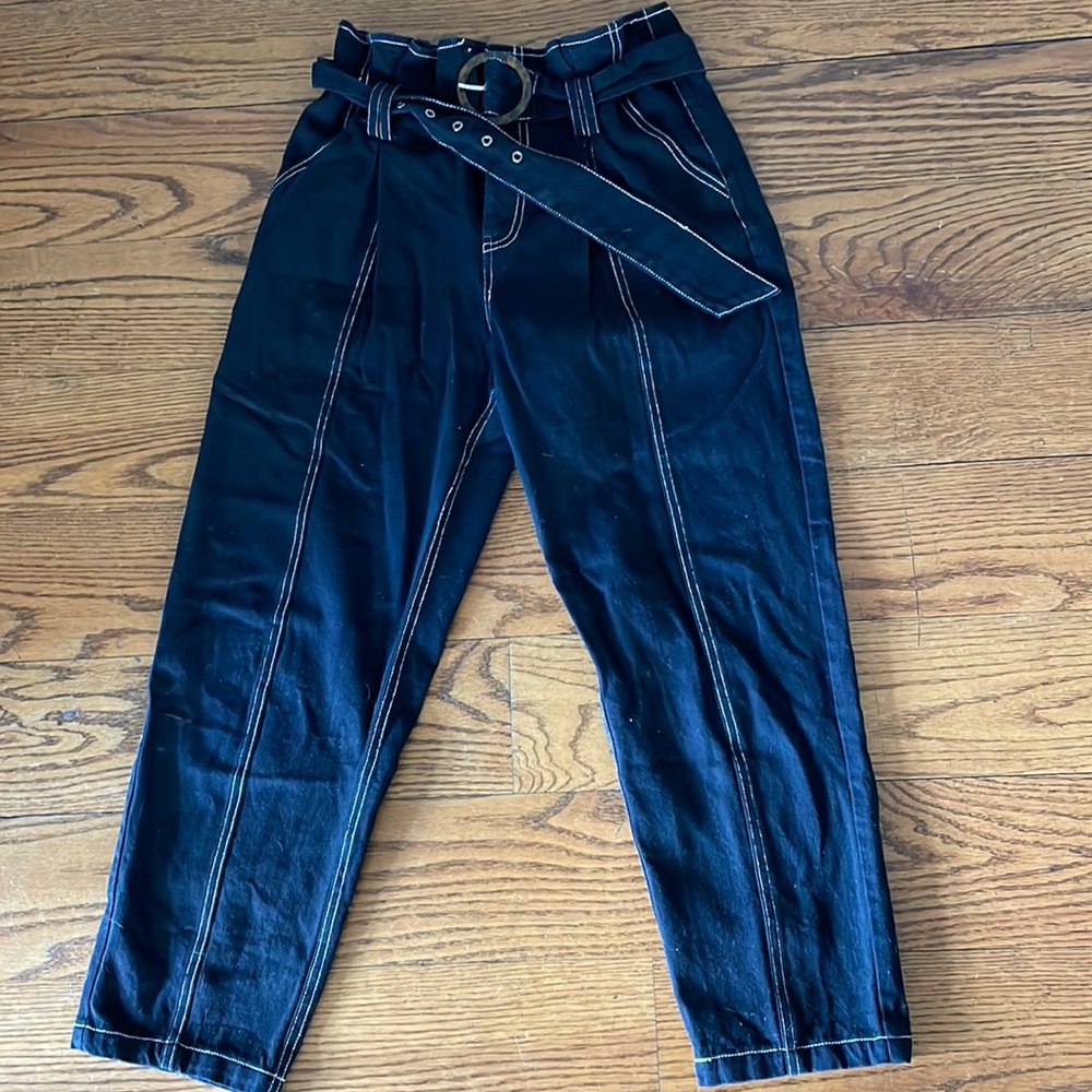 comfortable cargo material pants, loose but baggy fit. with a belt.